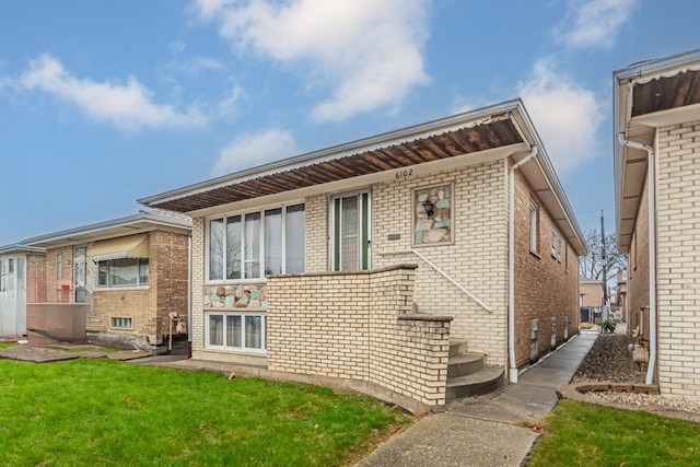 6102 W 64th St, Chicago, IL 60638 - back of property featuring brick siding and a yard