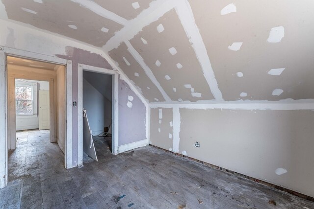 bonus room with vaulted ceiling