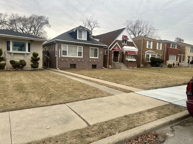 view of front of home with a front lawn