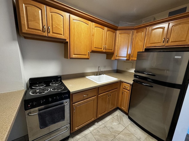 kitchen with stainless steel appliances and sink