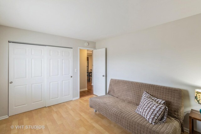 living area with light hardwood / wood-style floors