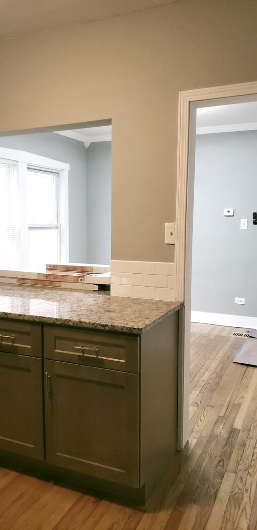 bathroom with hardwood / wood-style floors