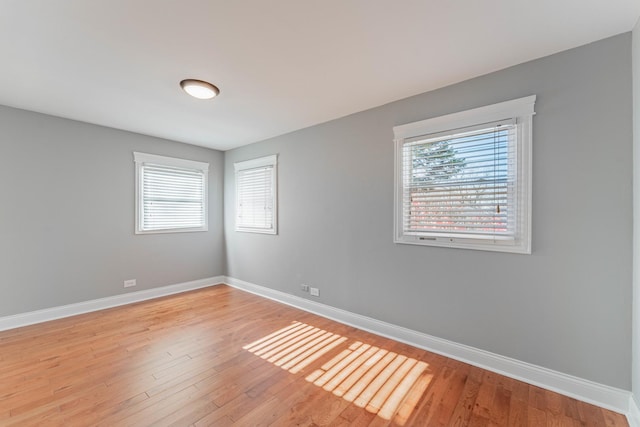 empty room with light wood-type flooring