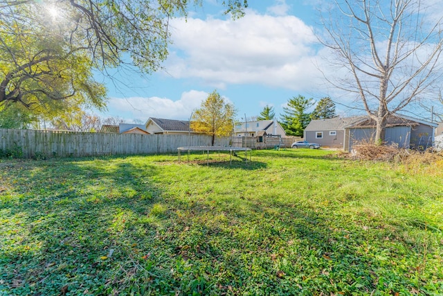 view of yard featuring a trampoline