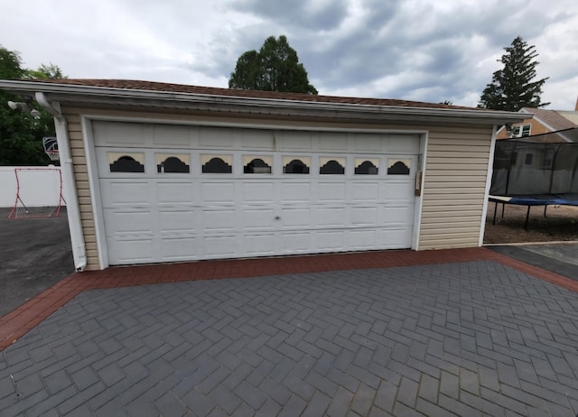 garage featuring a trampoline