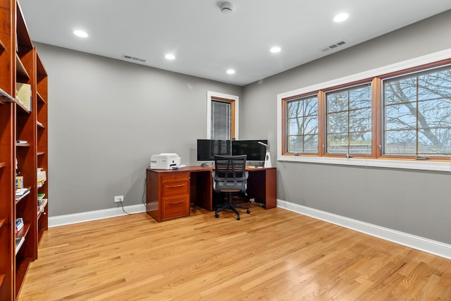 office area featuring light hardwood / wood-style floors