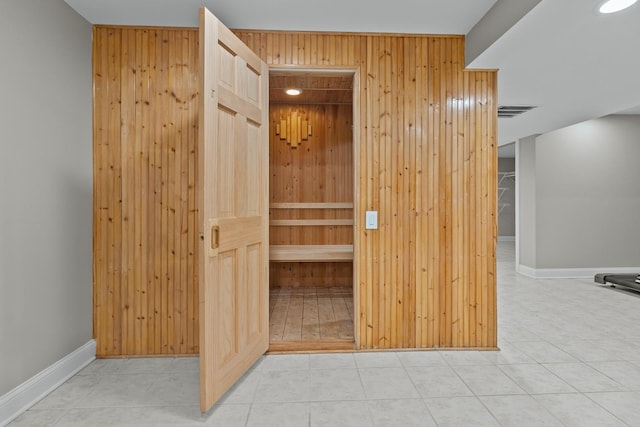 view of sauna featuring tile patterned floors