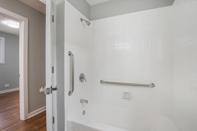 bathroom with hardwood / wood-style floors