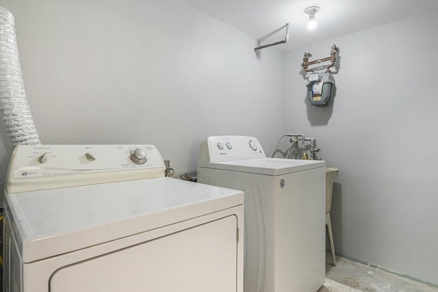 washroom featuring independent washer and dryer