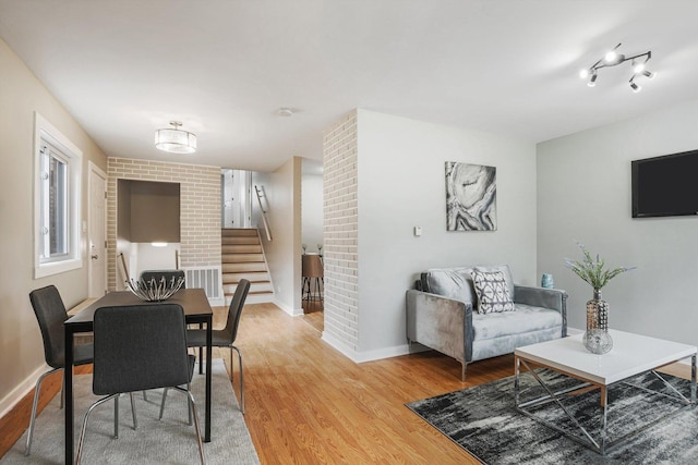 living room with light hardwood / wood-style floors