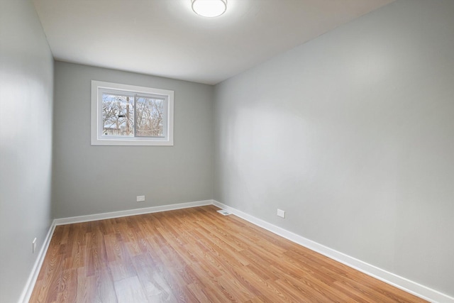 empty room featuring light hardwood / wood-style floors