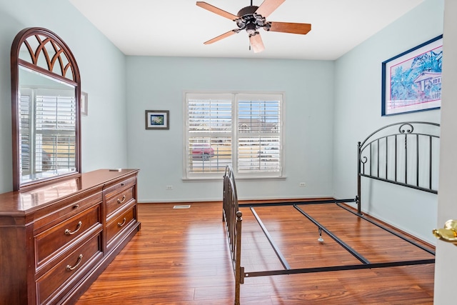 bedroom featuring hardwood / wood-style floors