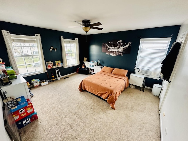 bedroom with carpet floors and ceiling fan