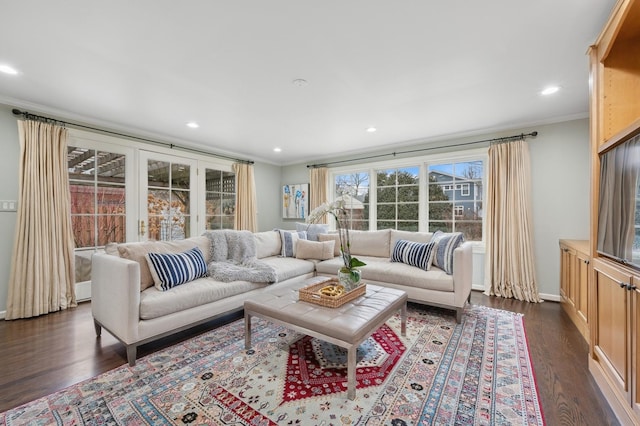 living room featuring dark hardwood / wood-style flooring and ornamental molding