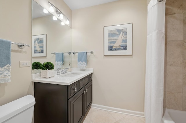 full bathroom with vanity, toilet, tile patterned flooring, and shower / bath combo