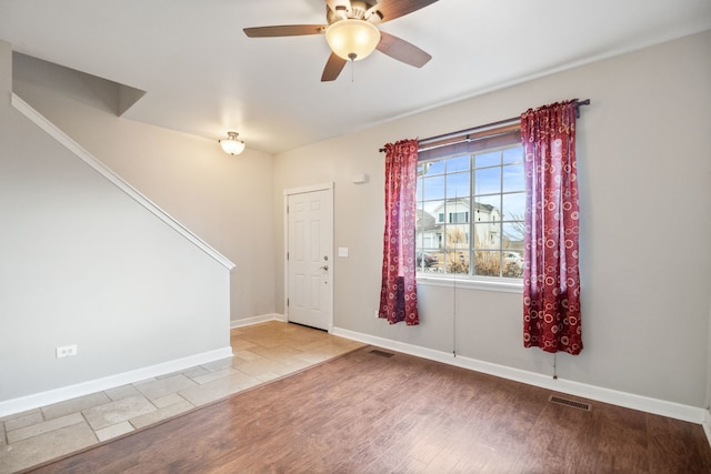 entrance foyer featuring light hardwood / wood-style floors and ceiling fan