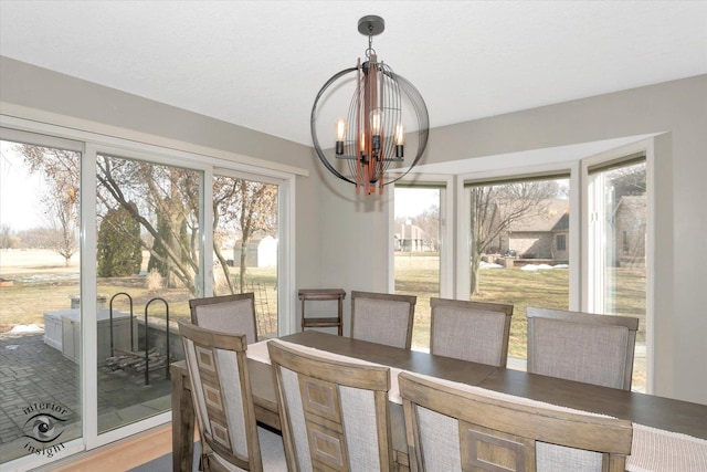 dining space featuring a chandelier