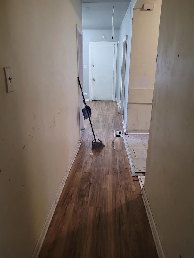 hallway featuring hardwood / wood-style flooring