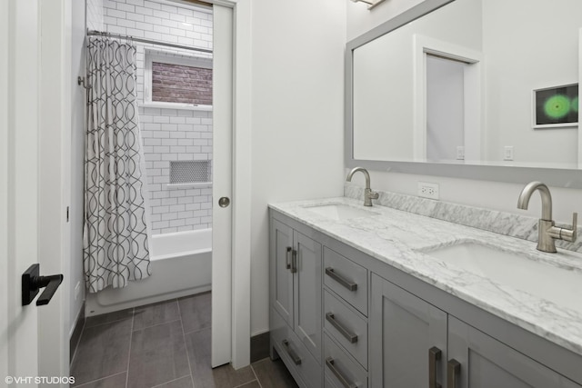 bathroom with shower / tub combo with curtain and vanity