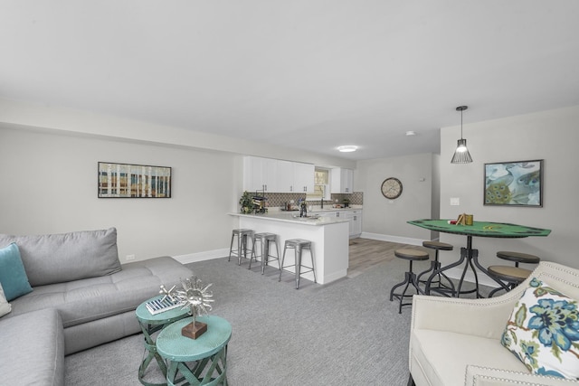 living room with light colored carpet