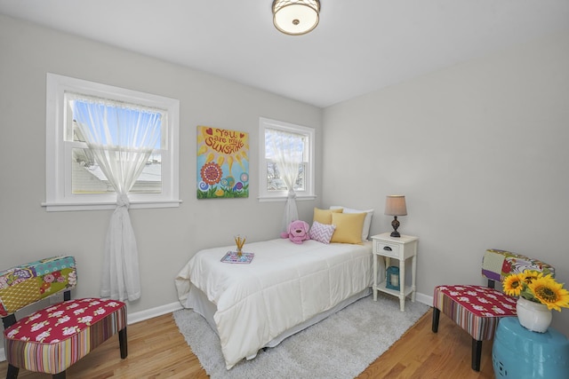 bedroom featuring hardwood / wood-style flooring