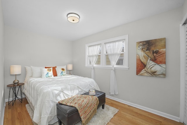 bedroom featuring wood-type flooring