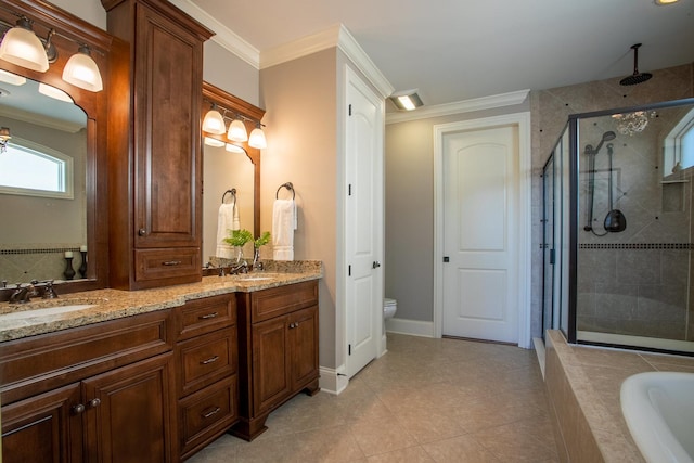 full bathroom with ornamental molding, separate shower and tub, vanity, and toilet