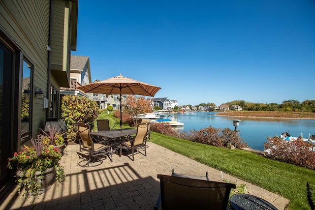 view of patio featuring a water view