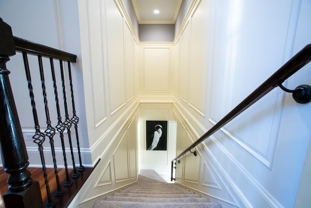 stairs with hardwood / wood-style flooring