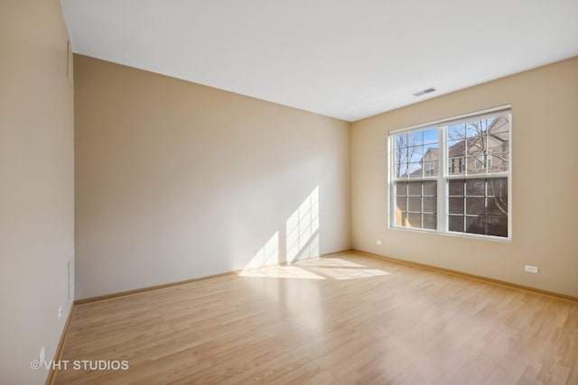 empty room featuring light wood-type flooring