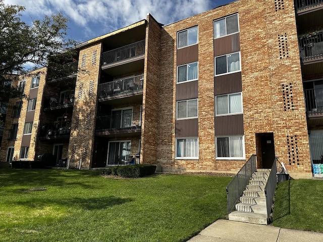 500 W Huntington Commons Rd Unit 152, Mount Prospect, IL 60056 - view of apartment building / complex