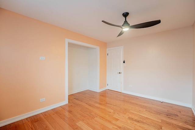 spare room with ceiling fan and light hardwood / wood-style flooring