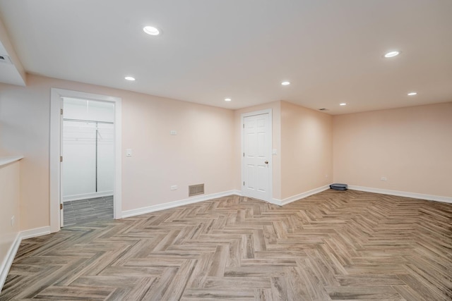 basement featuring light parquet floors