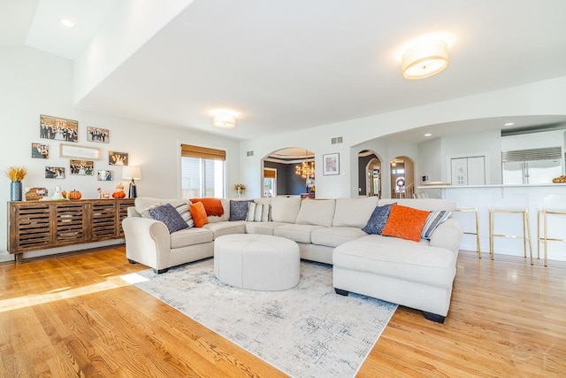 living room with light hardwood / wood-style floors