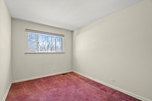 view of carpeted spare room