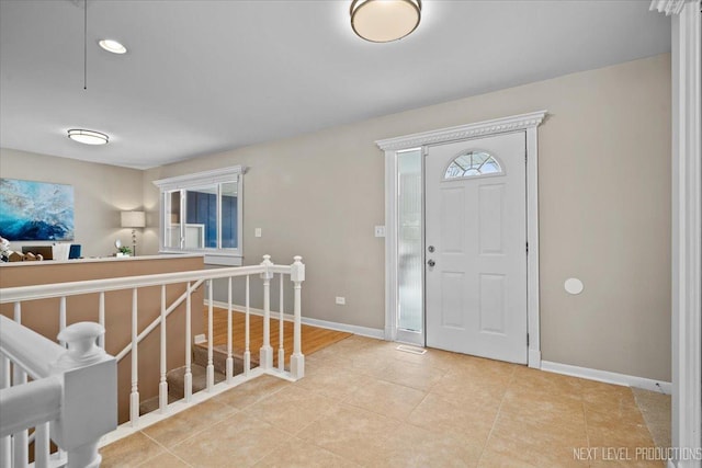 view of tiled foyer entrance