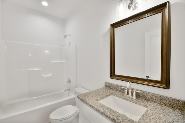 full bathroom featuring vanity, shower / tub combination, and toilet