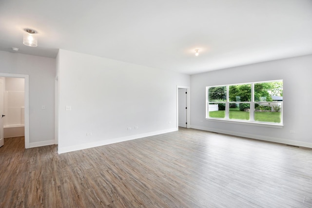 empty room featuring hardwood / wood-style floors