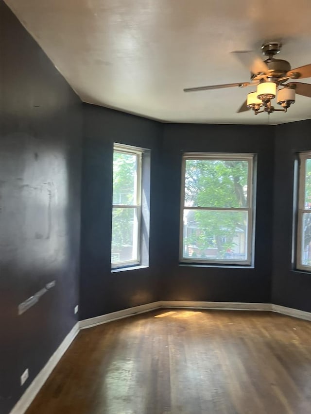 unfurnished room featuring wood-type flooring