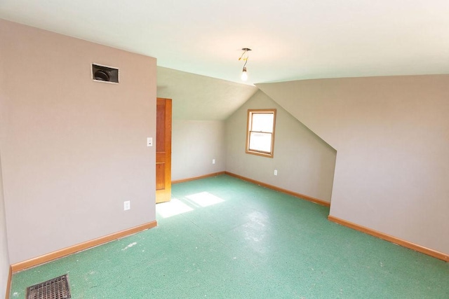 bonus room featuring vaulted ceiling