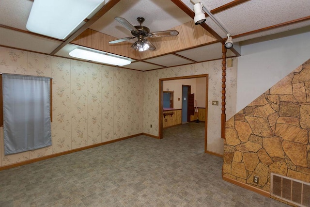 unfurnished room featuring ceiling fan