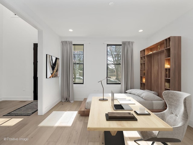 dining area with light wood-type flooring