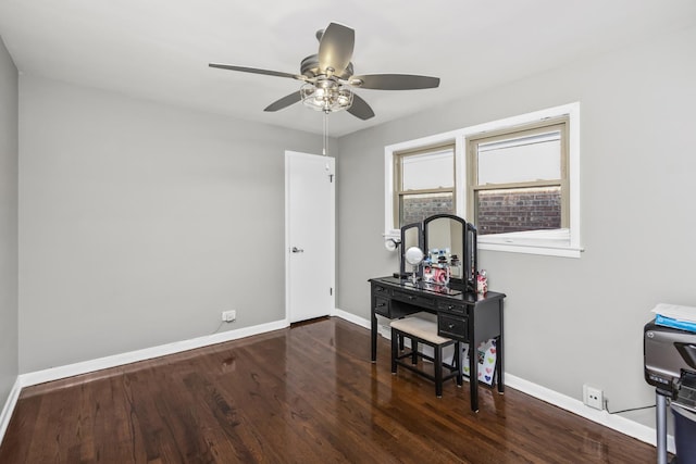 office area featuring dark hardwood / wood-style floors and ceiling fan