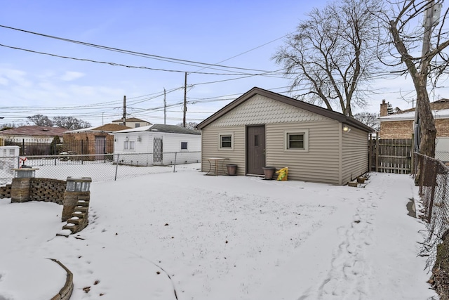 view of snow covered house