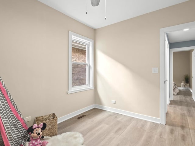 interior space featuring ceiling fan and light hardwood / wood-style flooring