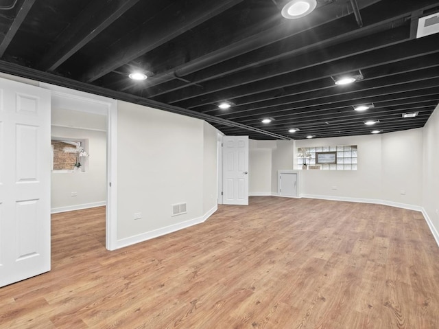 basement with light wood-type flooring