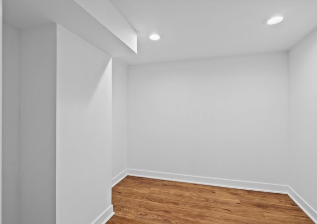 spare room with hardwood / wood-style floors