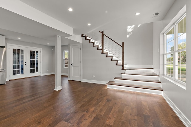 interior space with french doors and dark hardwood / wood-style flooring