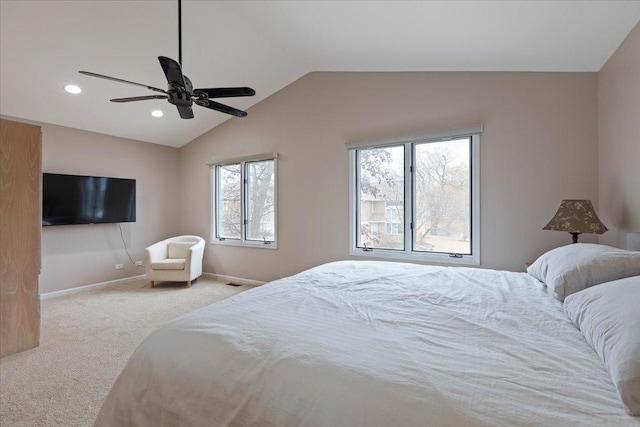 carpeted bedroom with lofted ceiling and ceiling fan