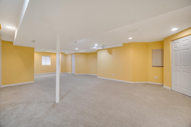 basement with light colored carpet